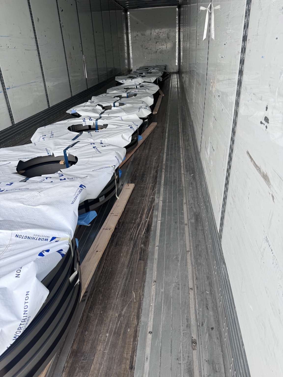 Industrial coil freight secured inside trailer
